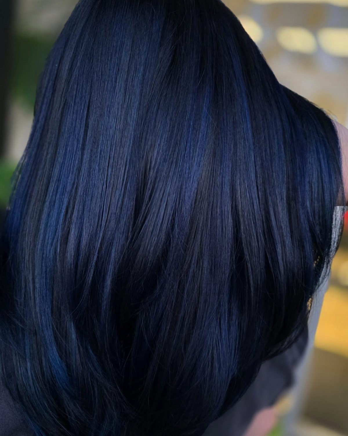Long glossy dark sapphire blue hair with subtle reflective blue highlights