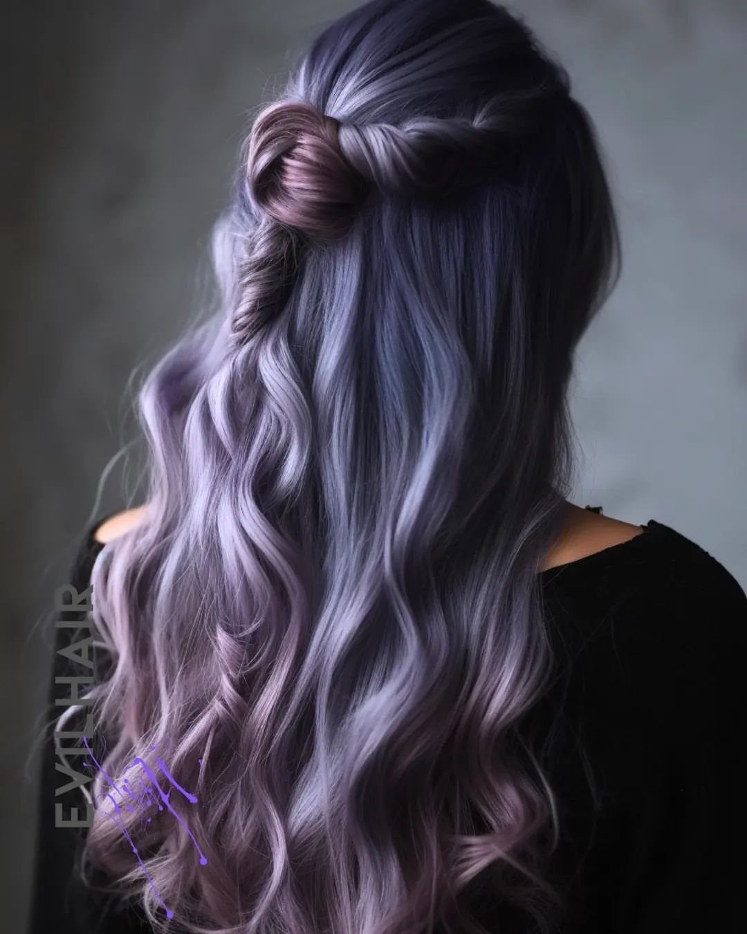 Long silver-lavender waves styled half-up with a twisted knot