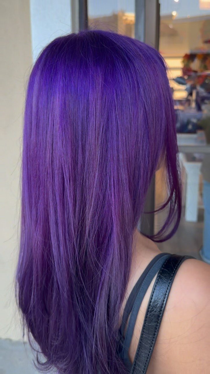 Long glossy violet-purple hair showing deep, shimmering amethyst tones