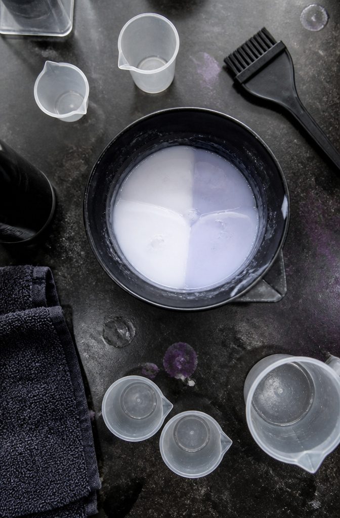 Ice silver blonde hair shown beside Redken formula details