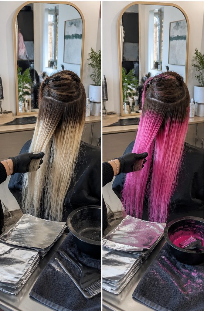 Dark hair beside a lightened blond section prepared for pink color