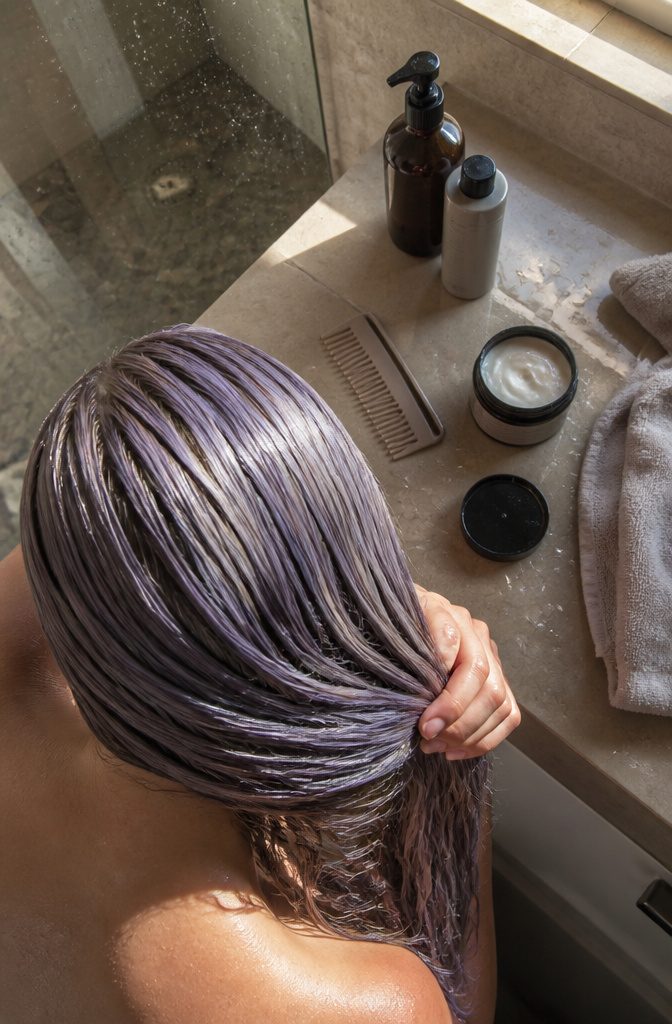 Purple grey hair with smooth strands and a cool silver tint