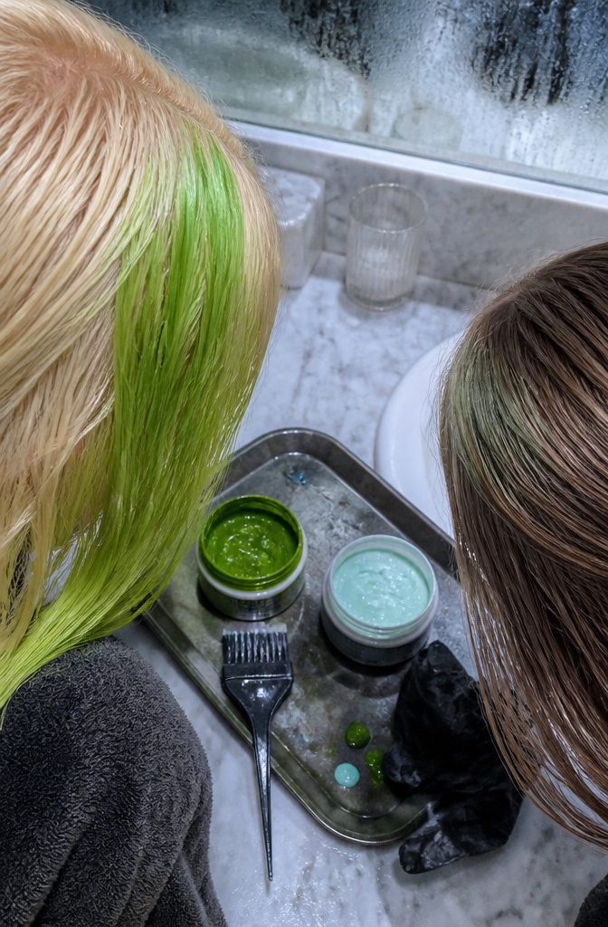 Direct hair dye being applied to strands without mixing